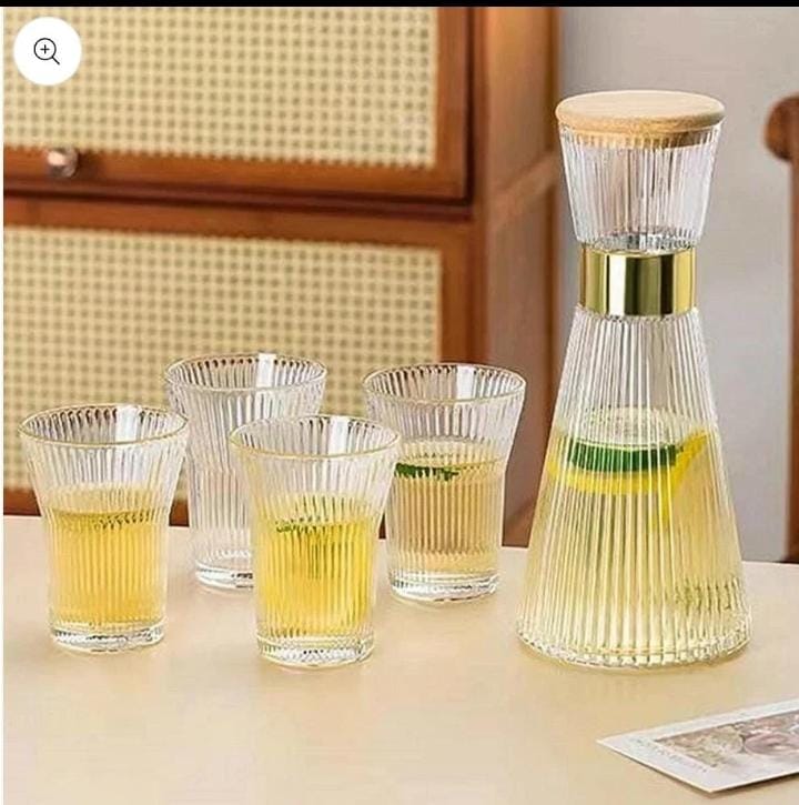 Elegant Glass Carafe with Glasses